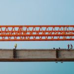 Engineers working on a bridge construction site