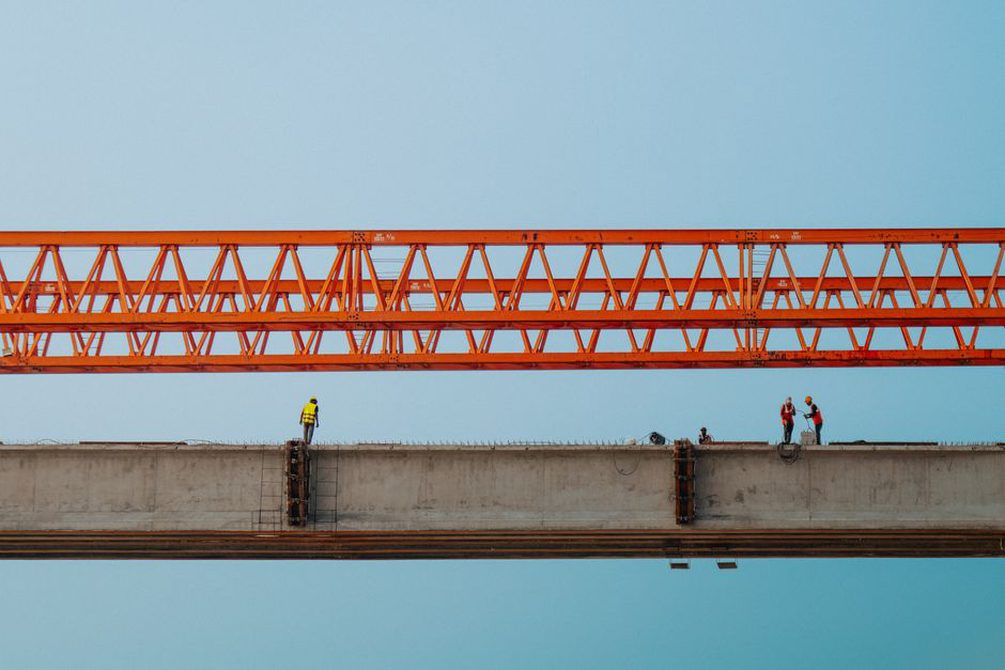 Engineers working on a bridge construction site