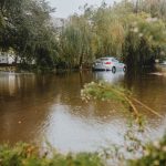 Flooded road highlighting climate impact