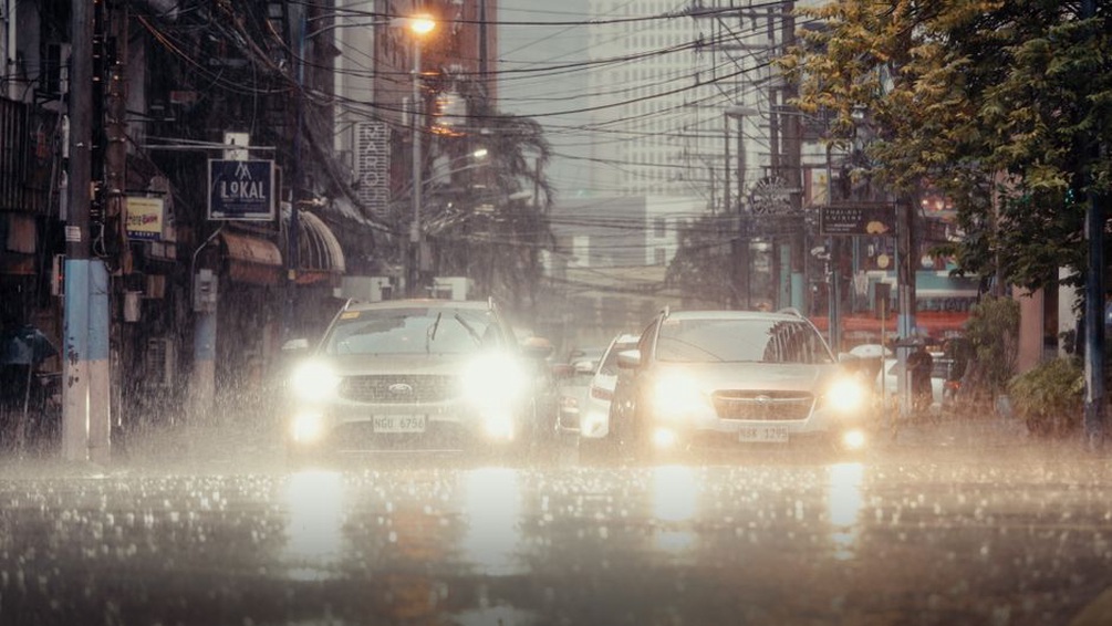 road with water drainage system during rain
