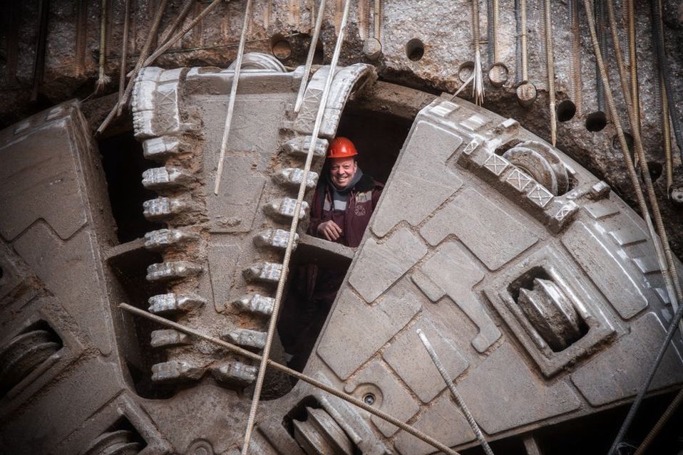 Tunnel boring machine excavating rock