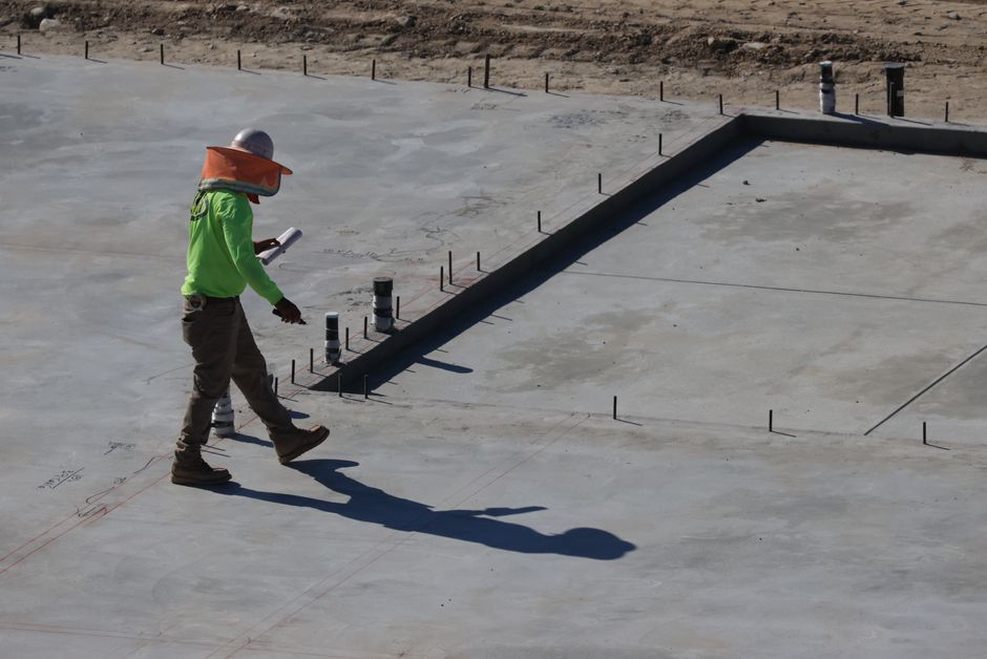 Engineer examines an aging bridge support