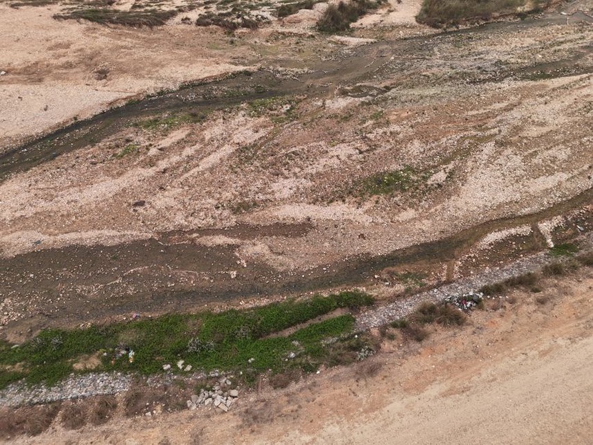 Riverbed around a pier where support conditions need checking