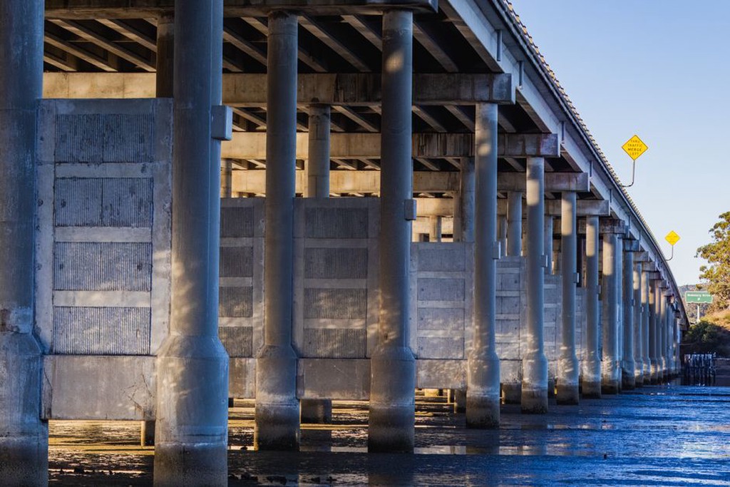 Foundation works beneath an elevated bridge span