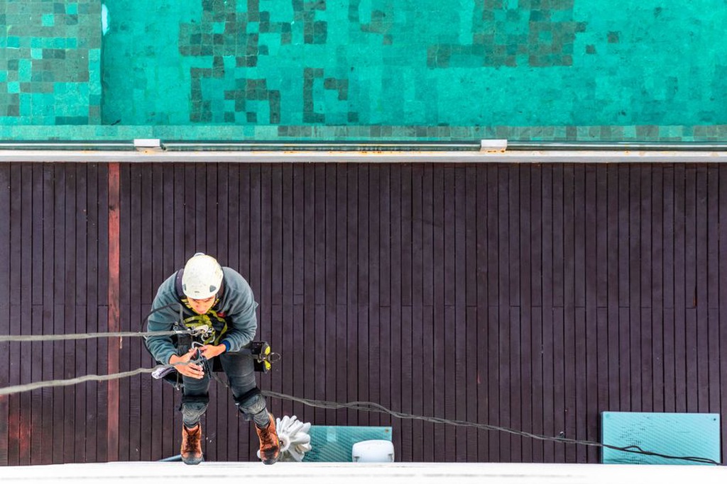 Engineer examining a concrete bridge member