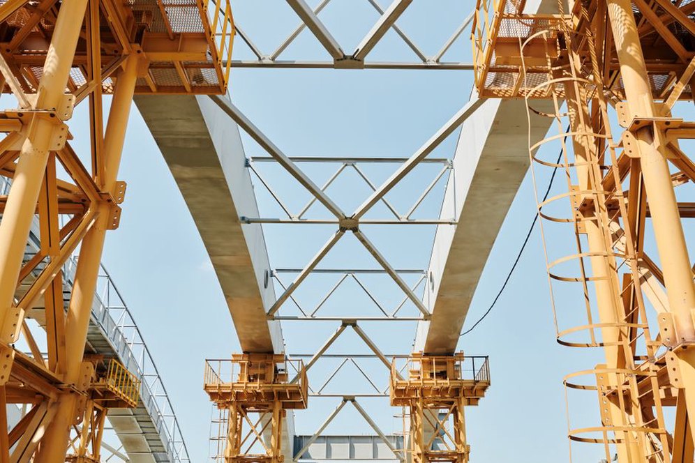 Sensor mounted beneath a roadway girder