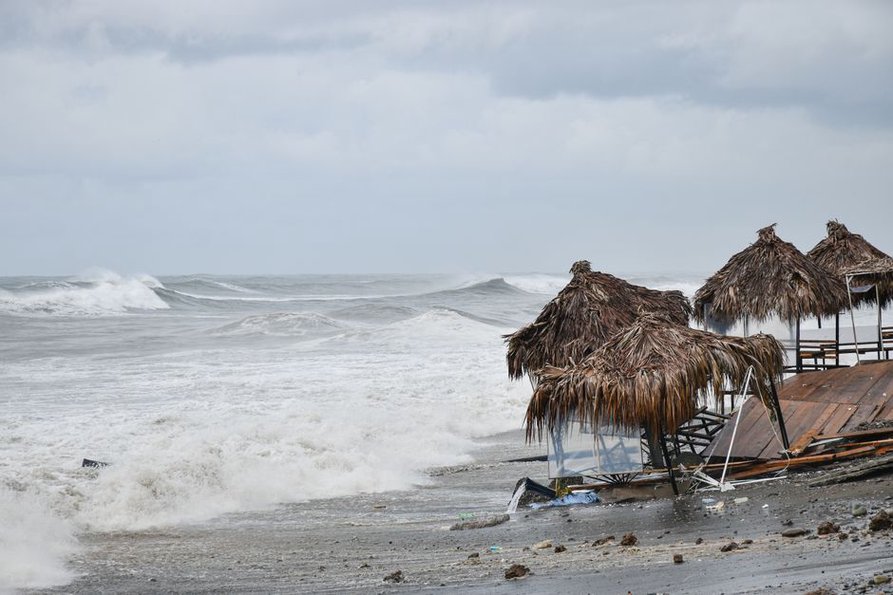 Waves overtopping a vulnerable coastal road
