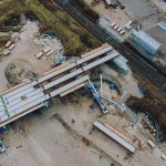 Survey drone above a railway bridge approach