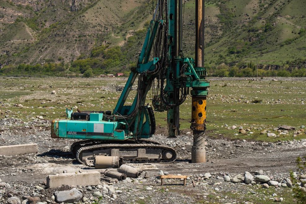 Boreholes investigate ground conditions beside a planned highway