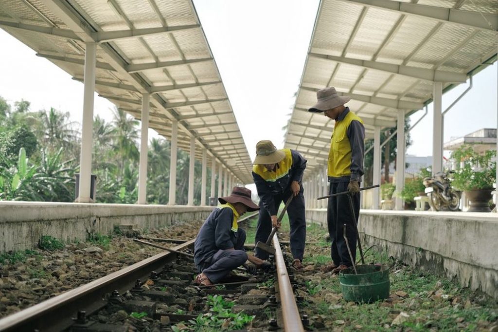 Inspectors assess track deformation after a slope failure