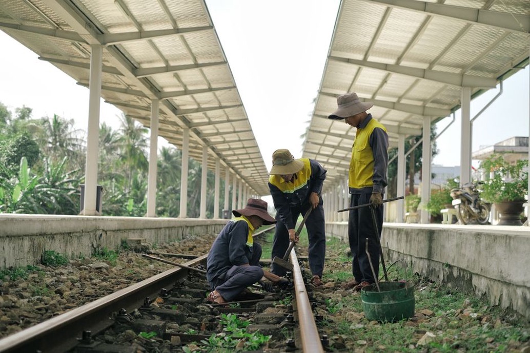 Inspectors assess track deformation after a slope failure