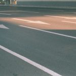 A pavement core exposes layers retained for assessment