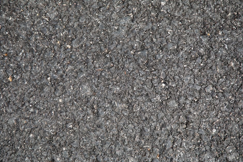 Open-textured pavement designed to limit rolling noise