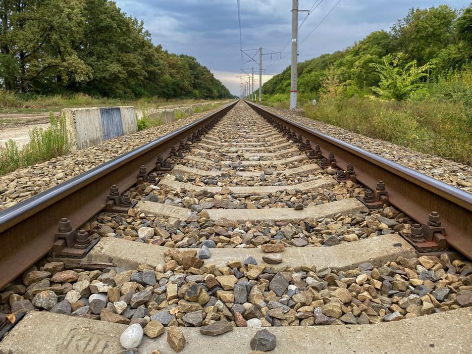 Drainage inspection beside a railway embankment