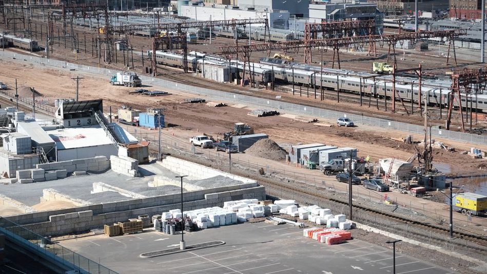 Engineers working on railway foundation construction
