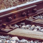 Ballasted track layers transferring load into prepared ground