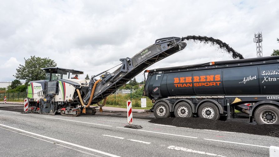 Reclaimed asphalt being processed for pavement reuse