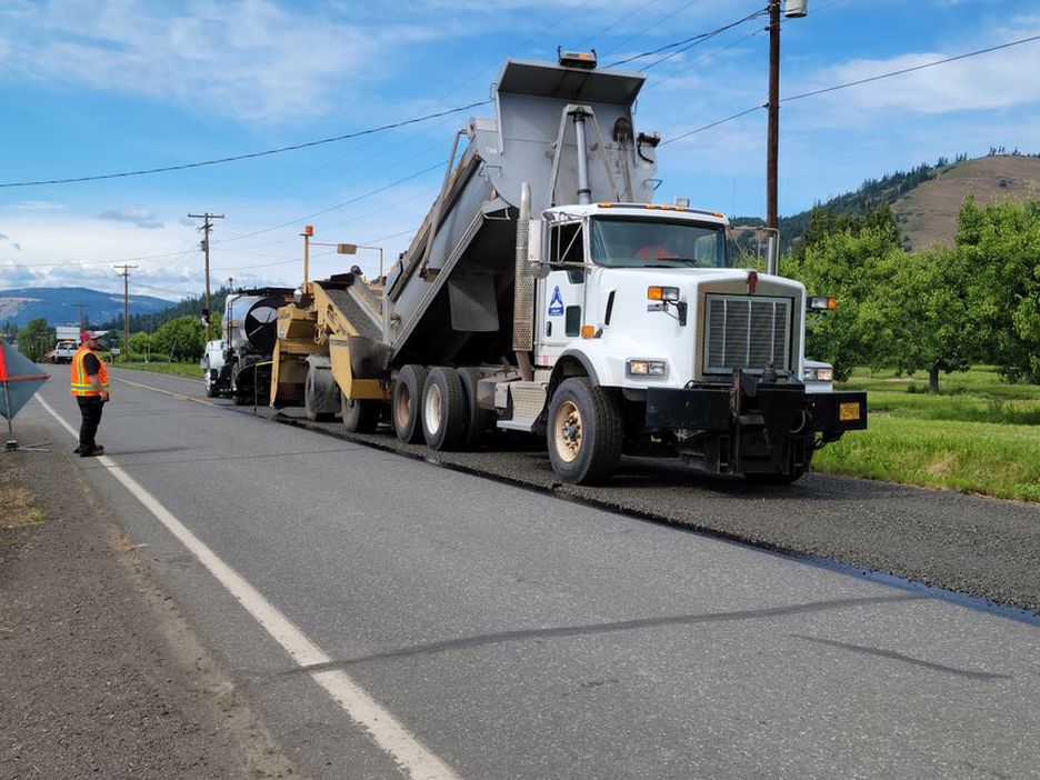 Modern road construction machinery during pavement rehabilitation