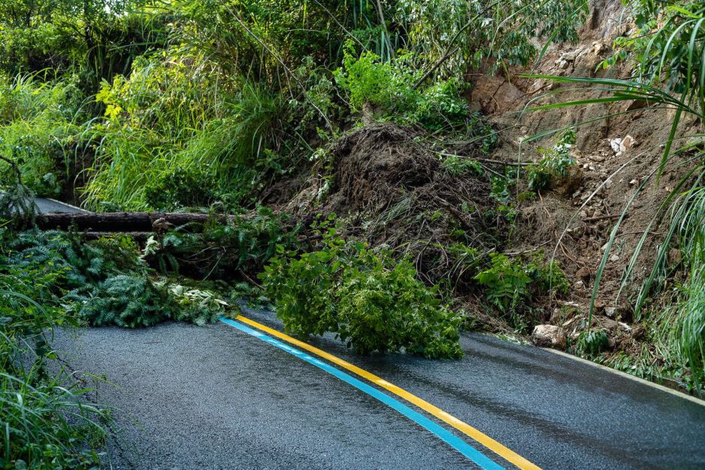 Debris reaches the ditch beside a road cutting