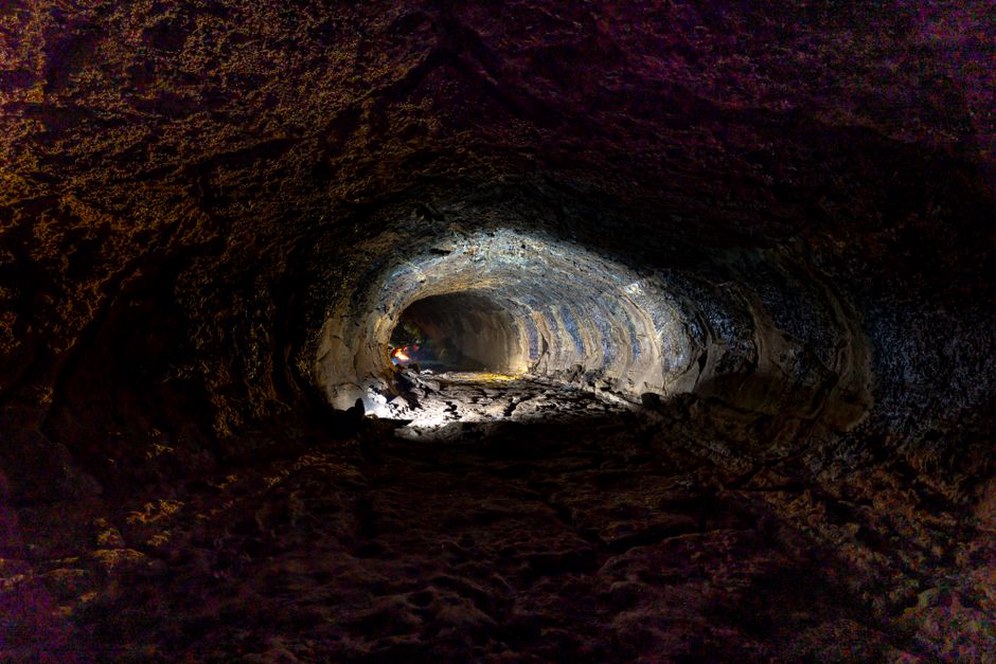 Engineers assess exposed ground at a tunnel face