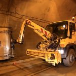 Maintenance team inspecting a tunnel structure