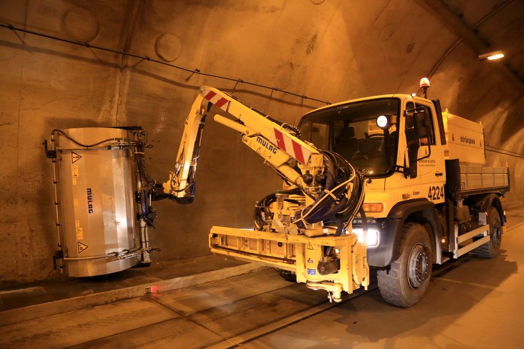 Maintenance team inspecting a tunnel structure
