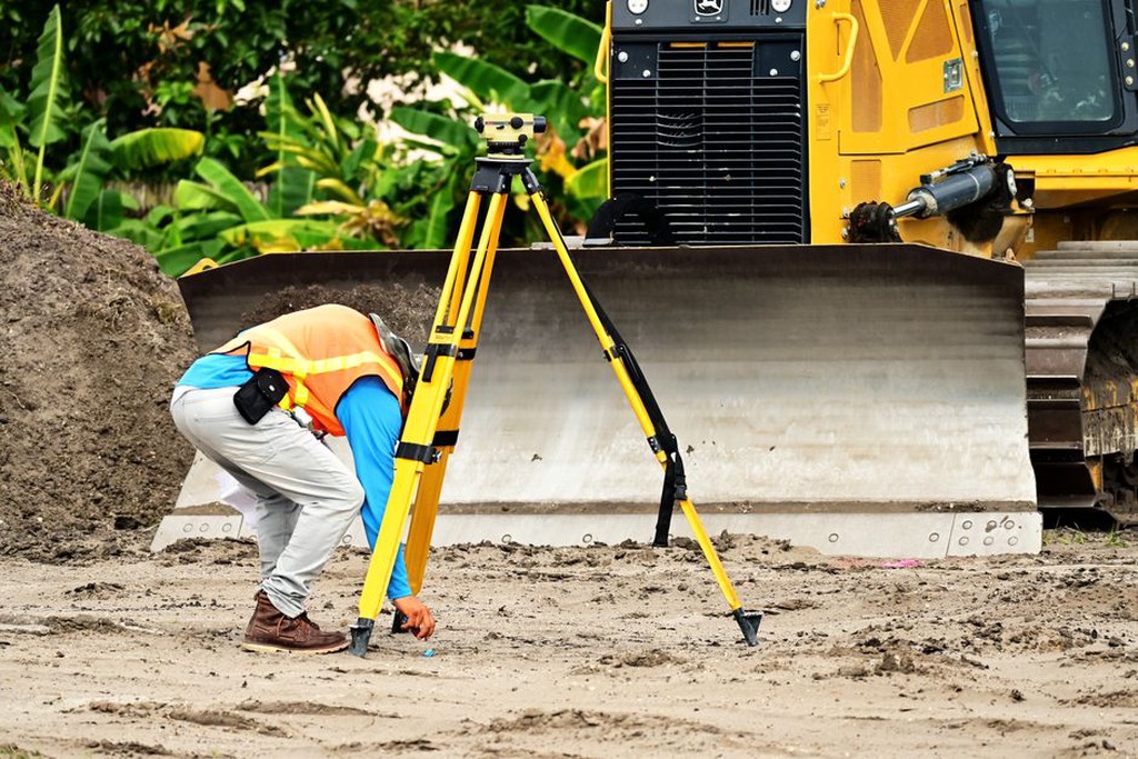 Survey control point beside a city excavation