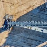 Radar survey equipment crossing a concrete bridge deck