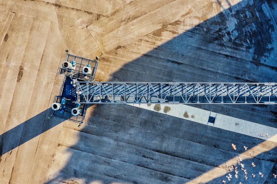 Radar survey equipment crossing a concrete bridge deck