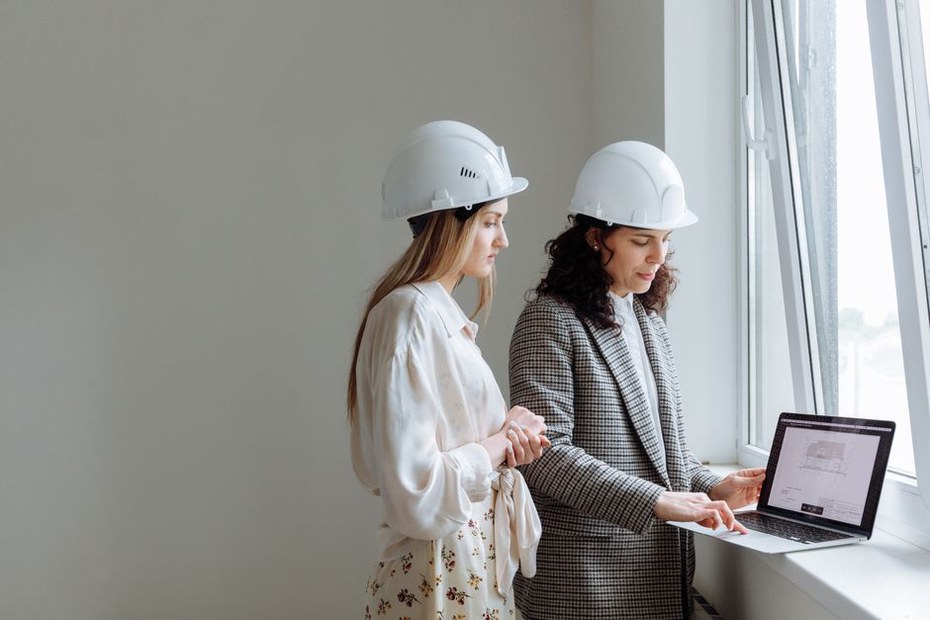 Engineer reviewing questions beside an inspection record