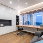Compact desk with daylight falling beside the screen