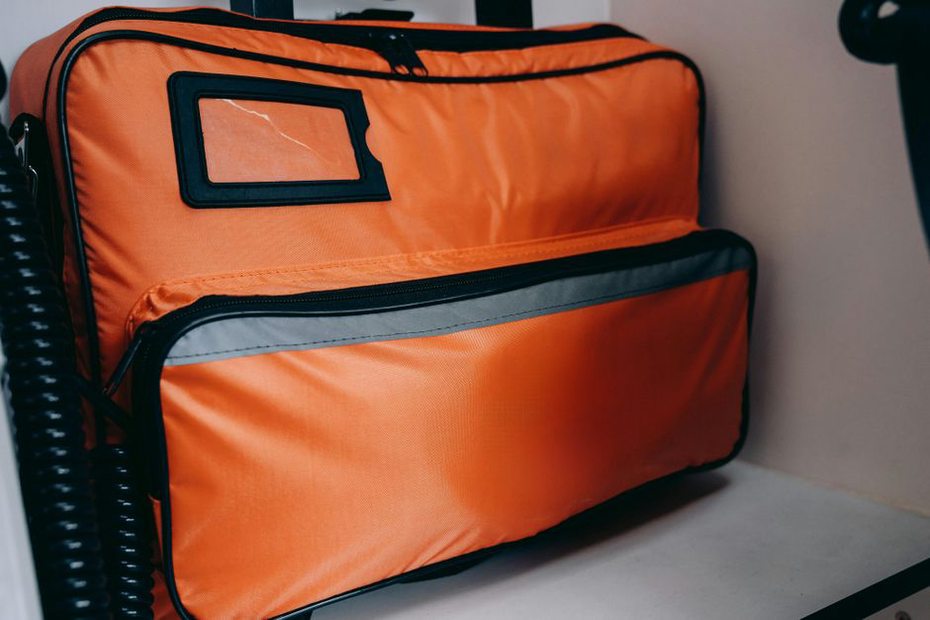 Packed supplies ready beside an accessible doorway