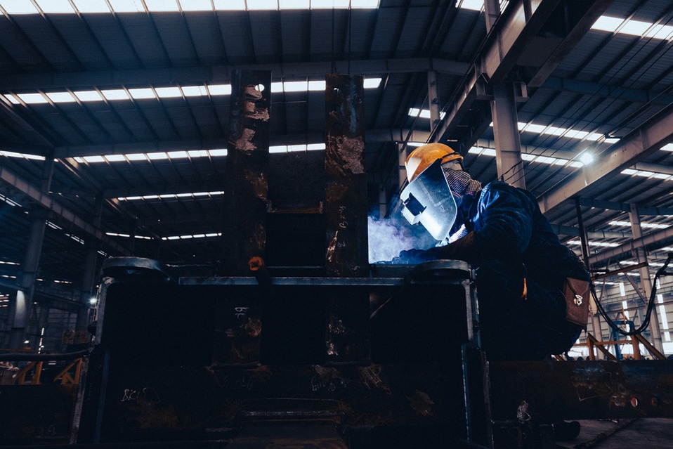 Ultrasonic probe held against a bridge steel connection