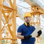 Engineer checking an inspection reference before sending a query