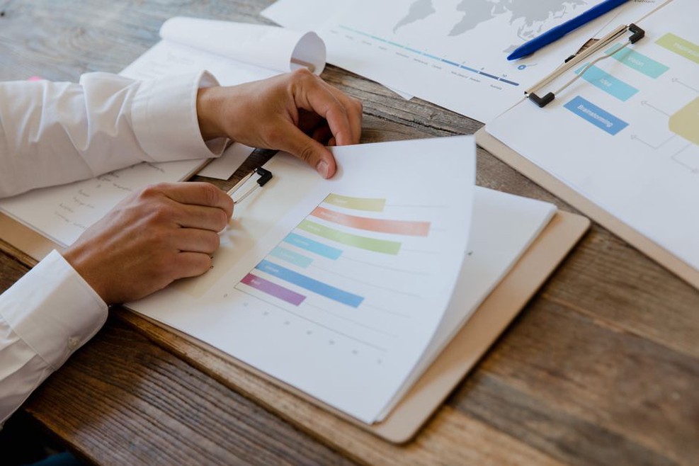 Inspection records beside an open engineering report