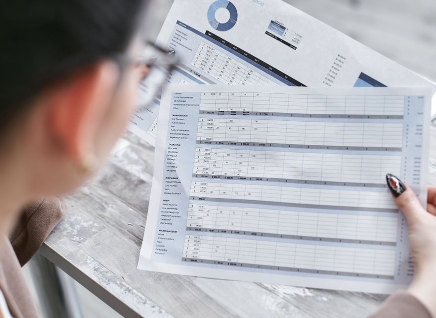 Research notes beside a comparison matrix