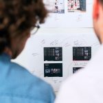 Engineer traces connections between technical pages