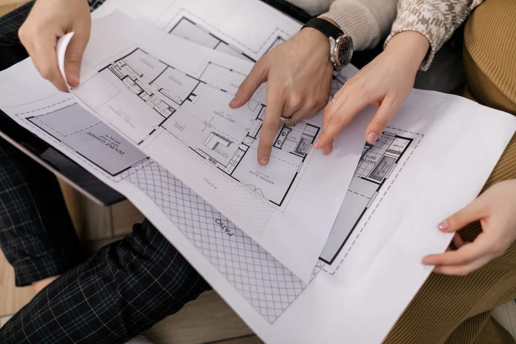 Editors comparing a diagram with its supporting text