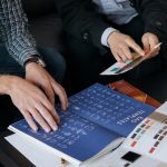 Type and colour samples arranged beside a page layout