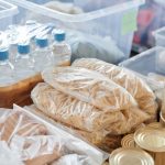 Sealed water containers stored on a reachable shelf