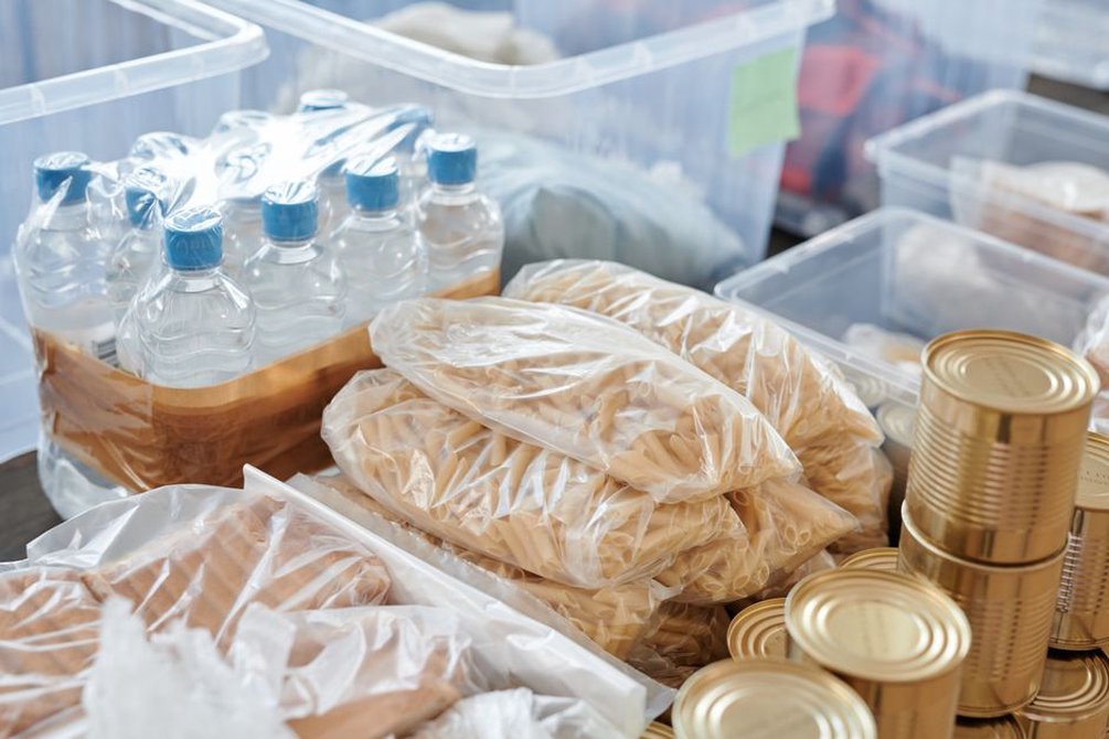 Sealed water containers stored on a reachable shelf
