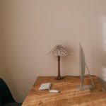 Feet supported beneath a home office desk