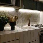 Light reaches the counter beneath wall cabinets