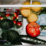 Dry greens stored loosely in a produce drawer