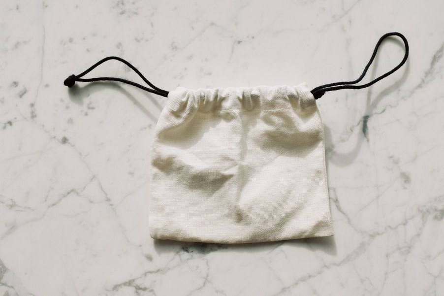 Toiletries and clothing separated inside a weekend bag