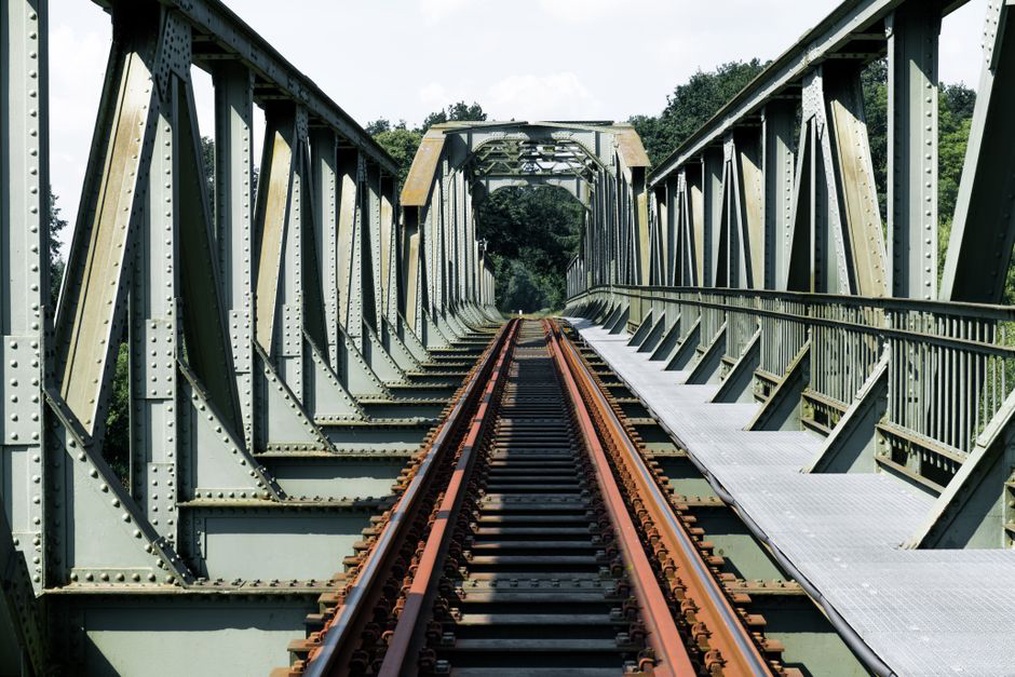Rail tracks crossing the boundary between bridge and embankment