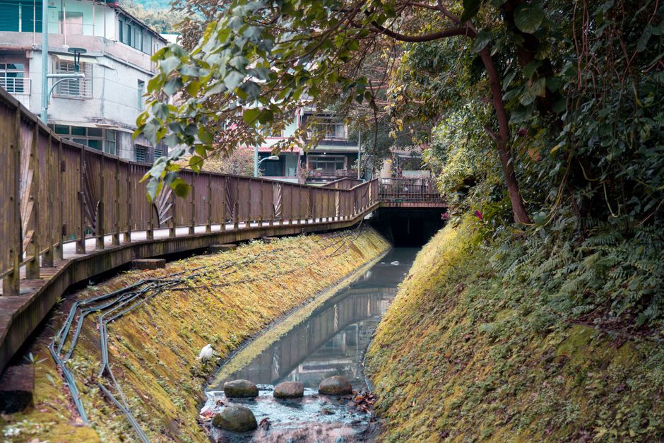 Drainage inspection along a wet railway embankment