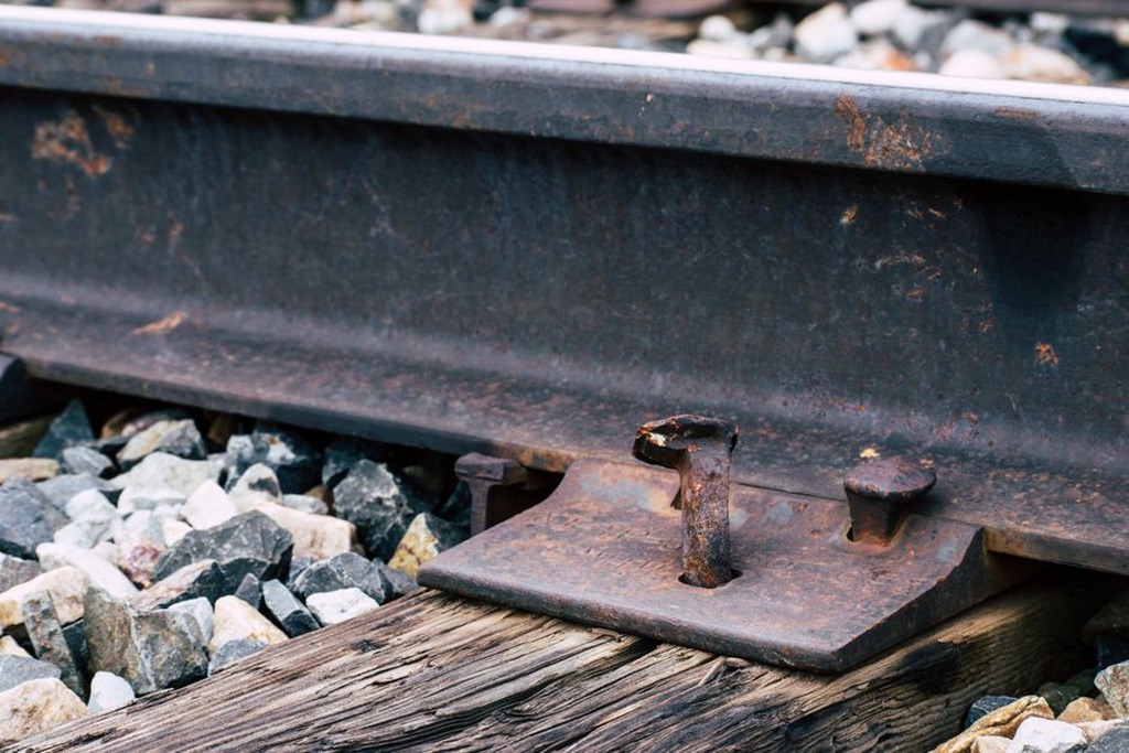 Rail clip and pad seated on a concrete sleeper