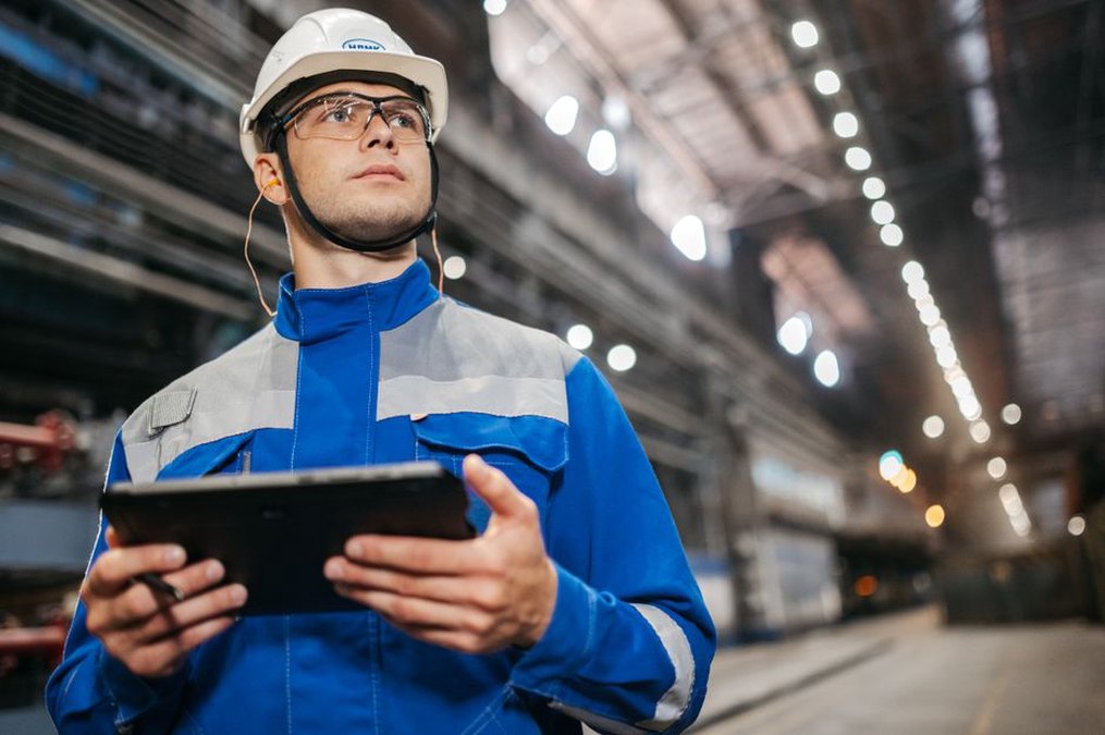 Field inspector reviews track measurements on site